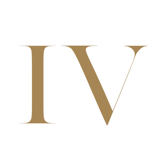 Logo for Italian Venues: IV in gold font with a white circular background